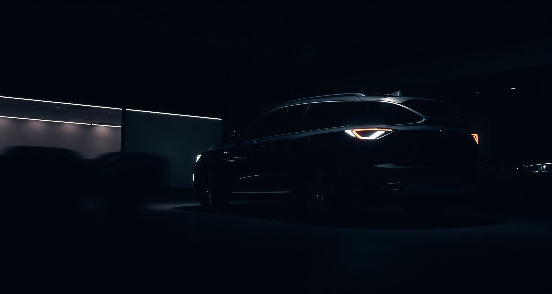 Modern SUV under dramatic showroom lighting